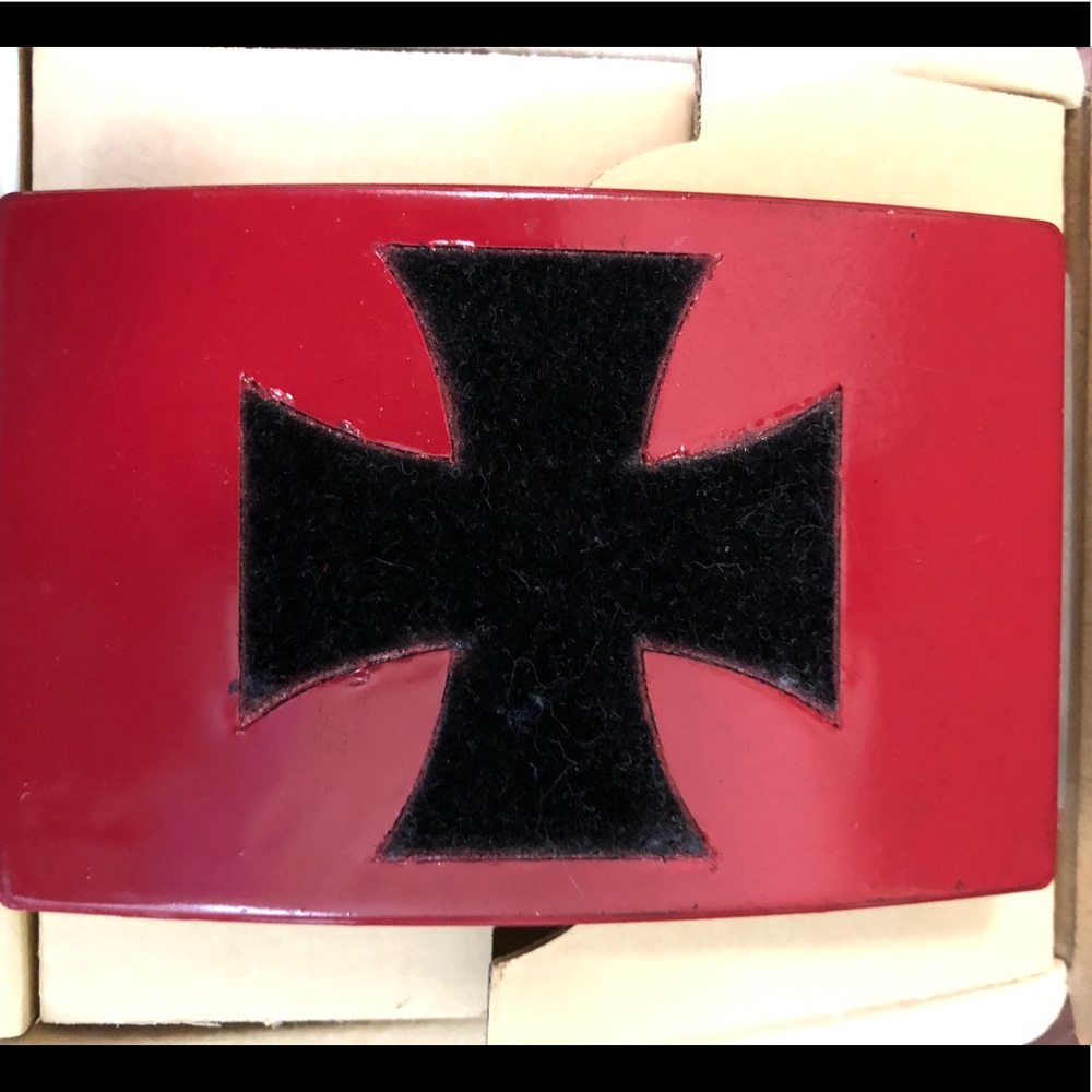Used retro belt buckle with a velvet iron cross
